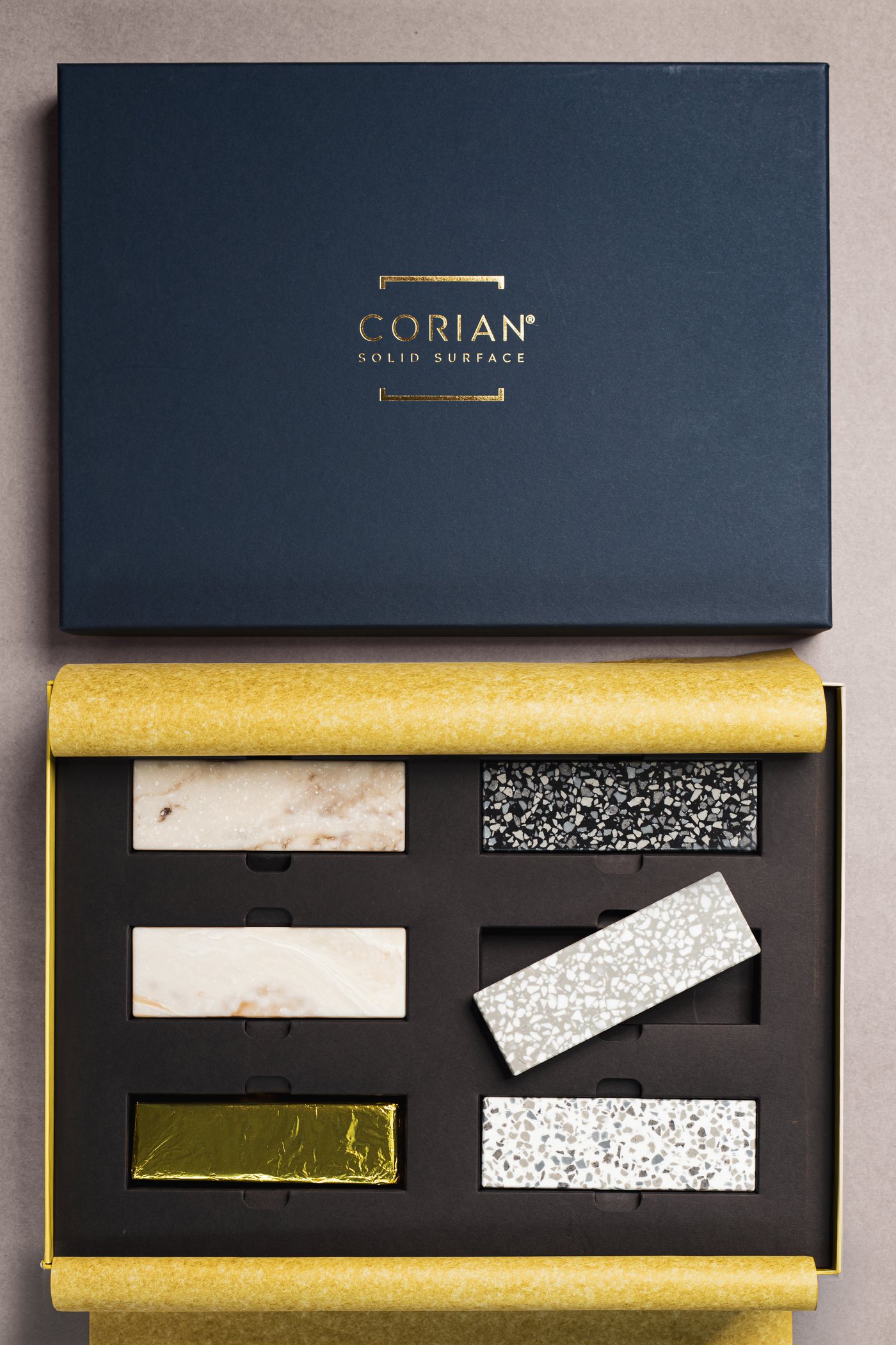 The Corian box opened to show the samples