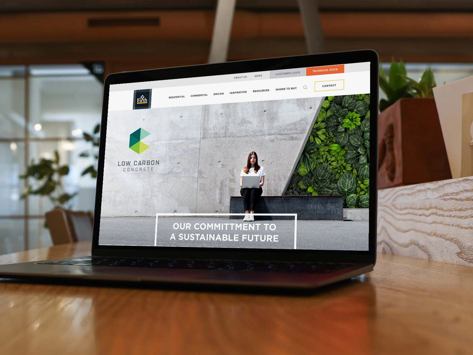 The Firth Low Carbon Concrete landing page on a laptop
