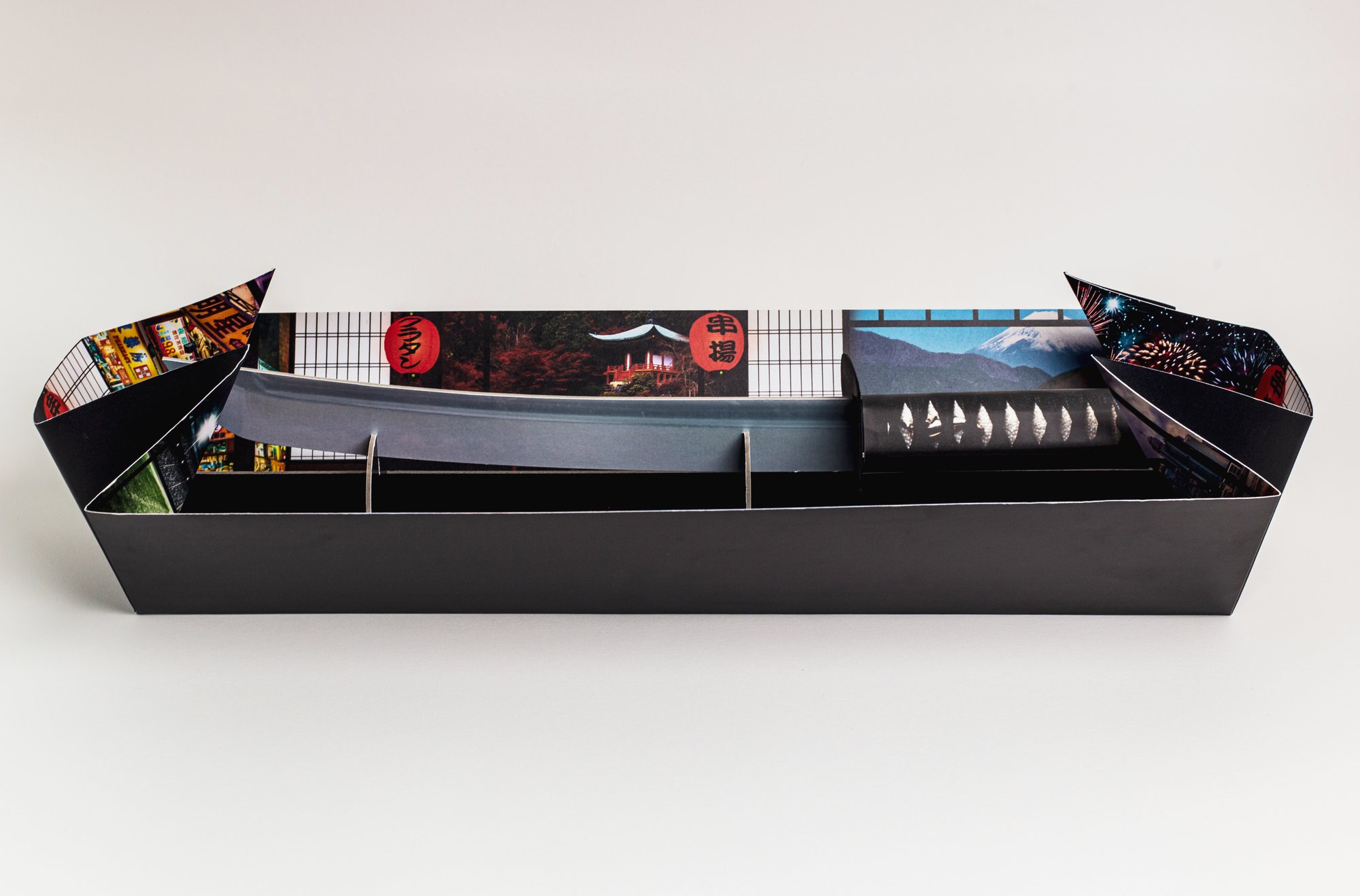 The sword inside the open box