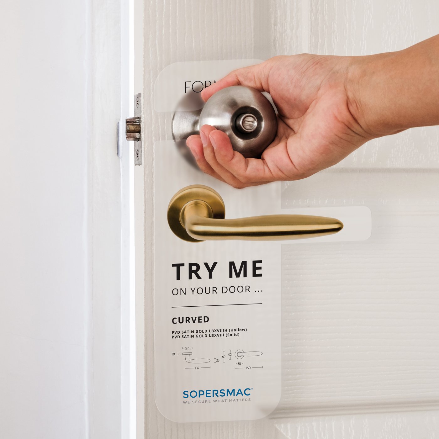 A Sopersmac door hanger on a door